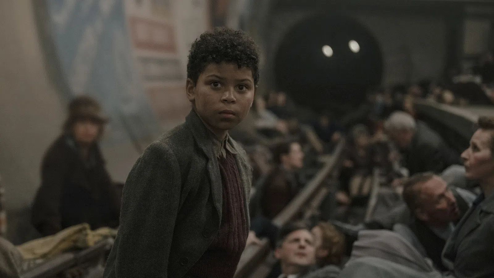 a person standing in front of a group of people