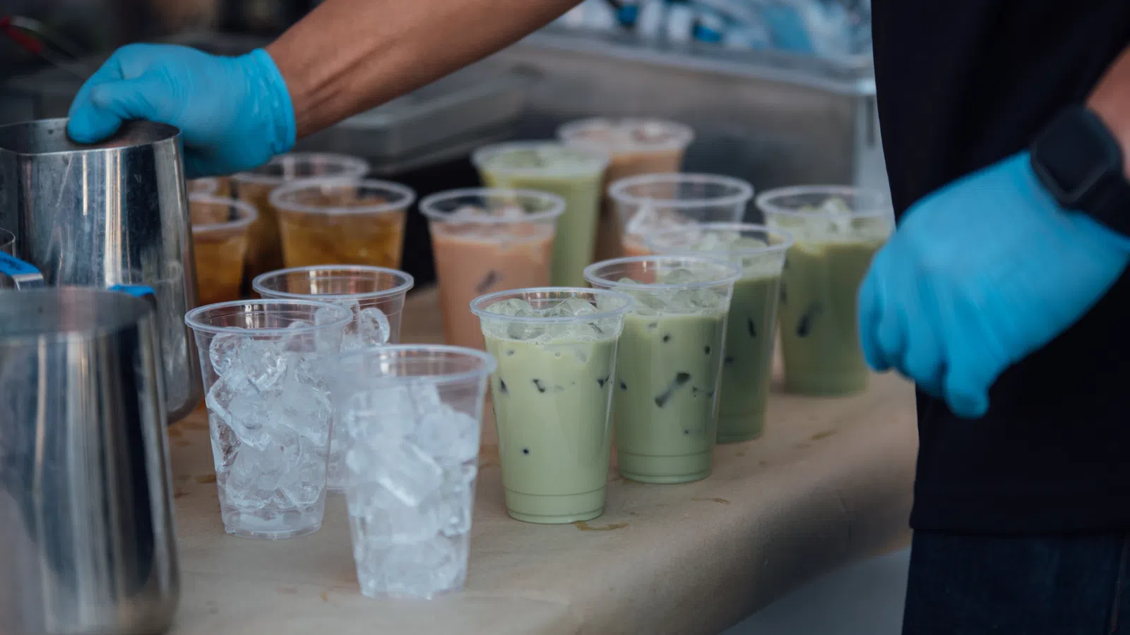 a group of glasses with liquid in them