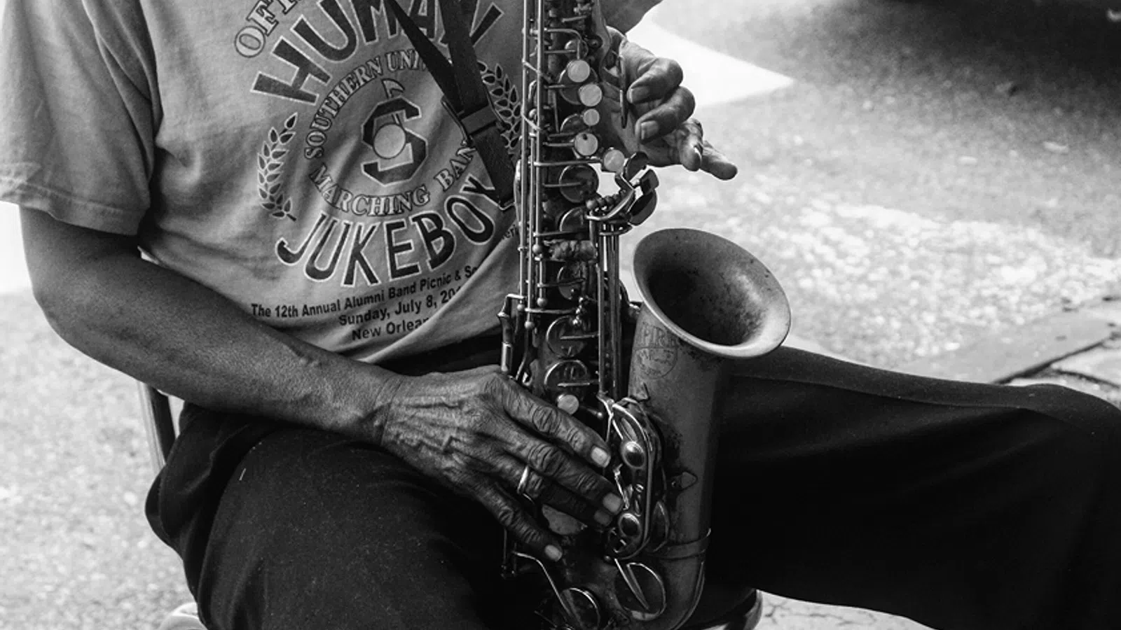 a man playing a saxophone