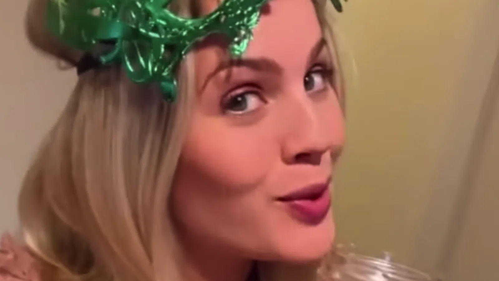 a woman with a green headband