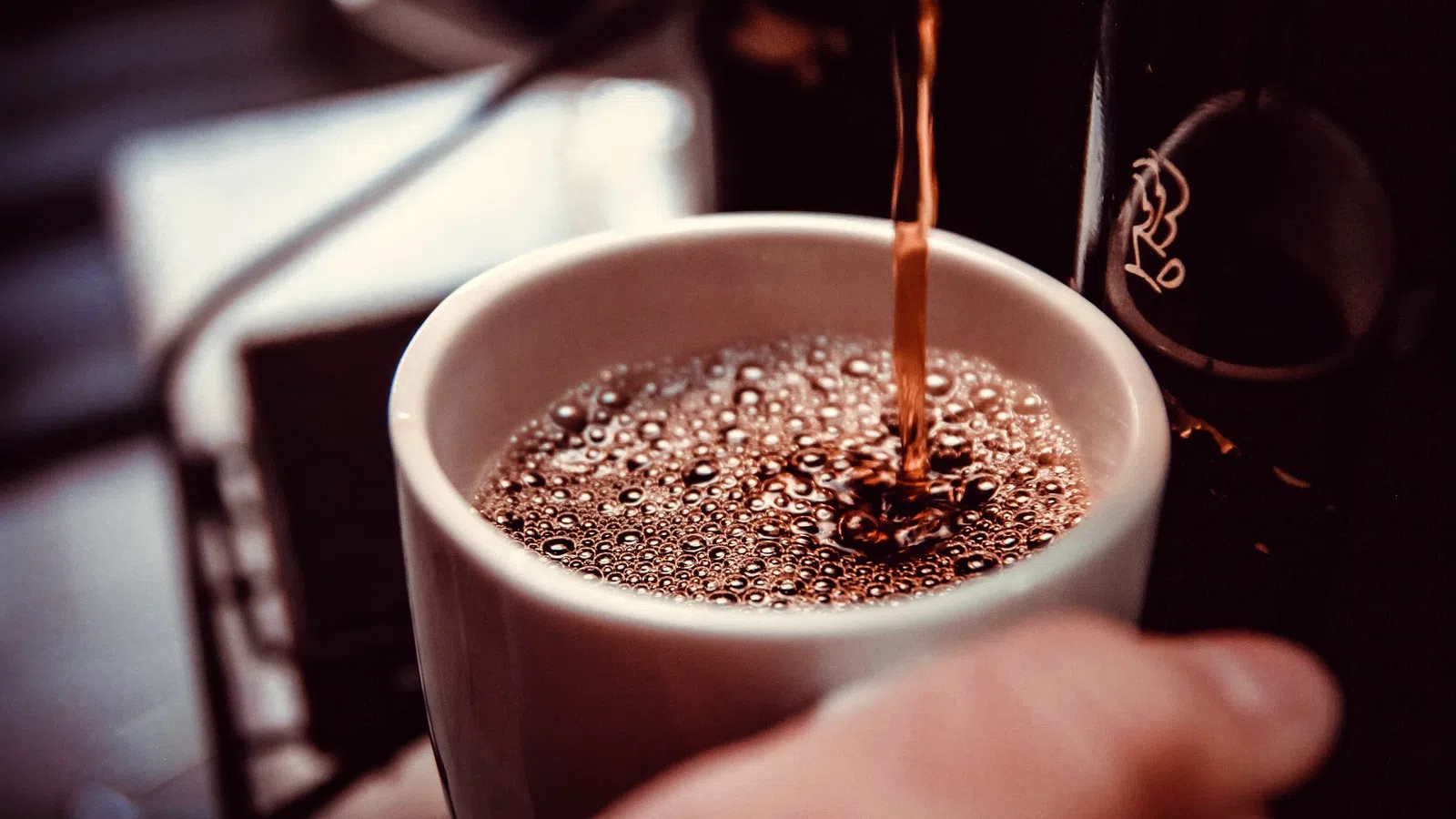 a cup of coffee on a table