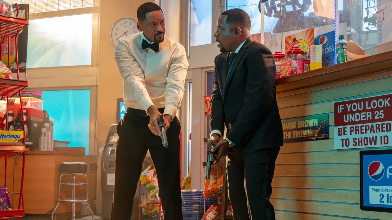 a couple of men in a store