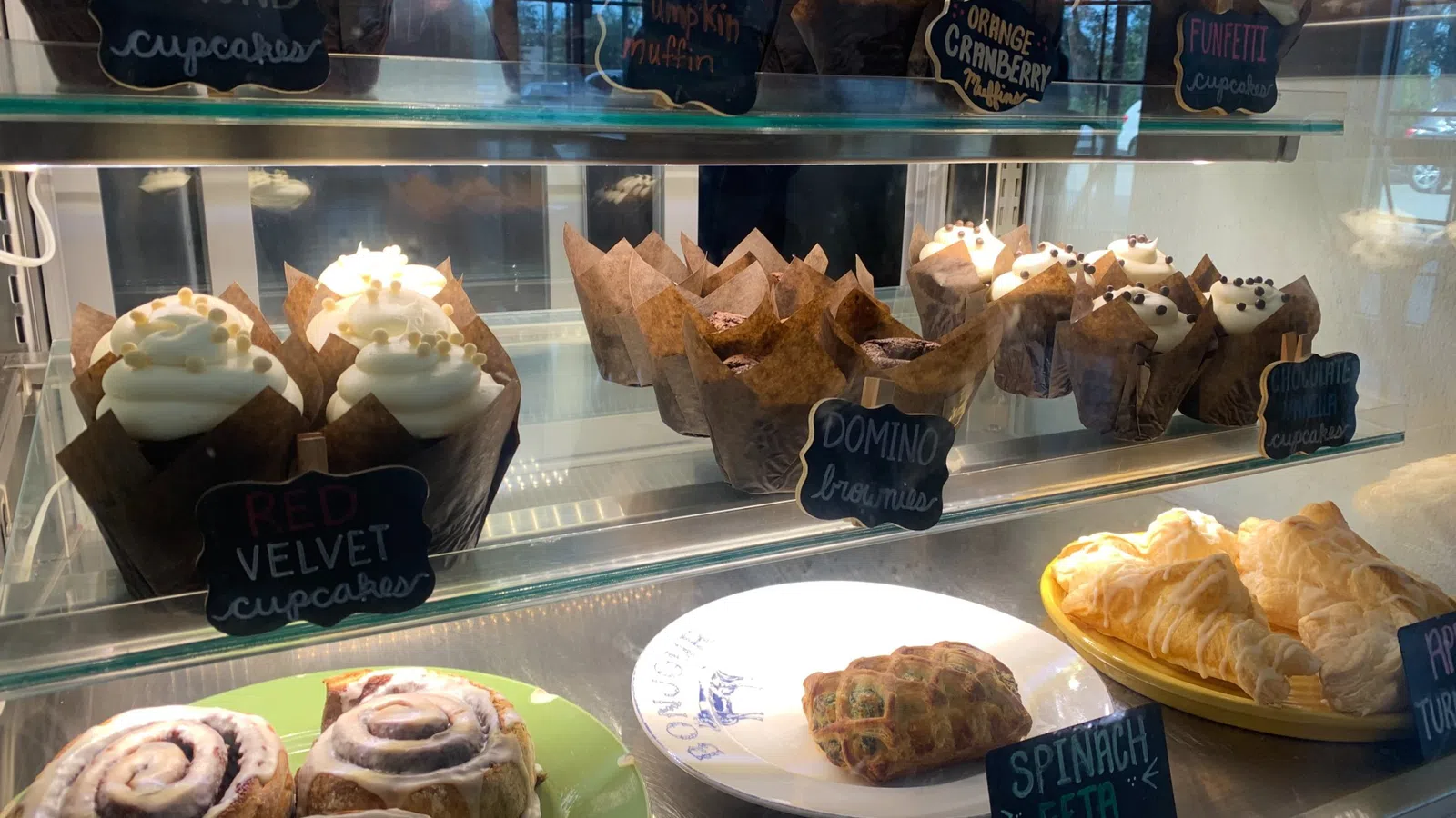 a display case with pastries