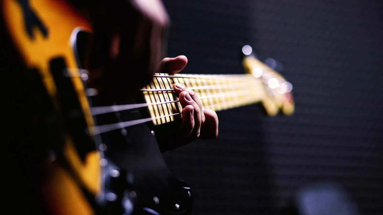 a person playing a guitar