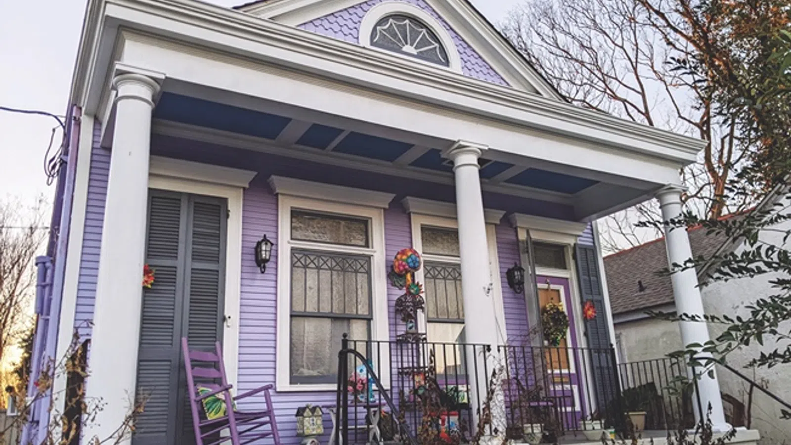 a house with a porch and a fence