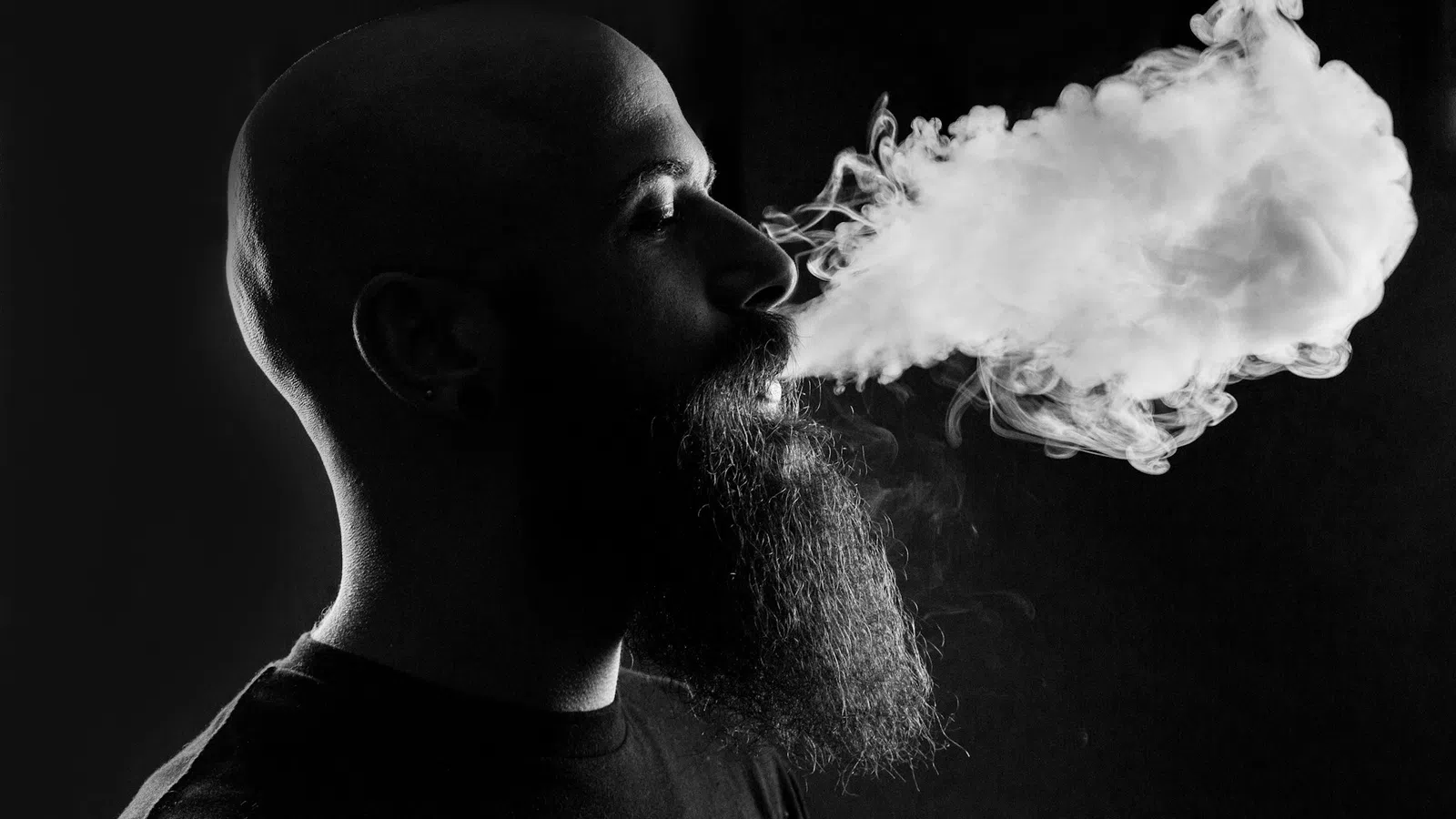 a man with a smokey face