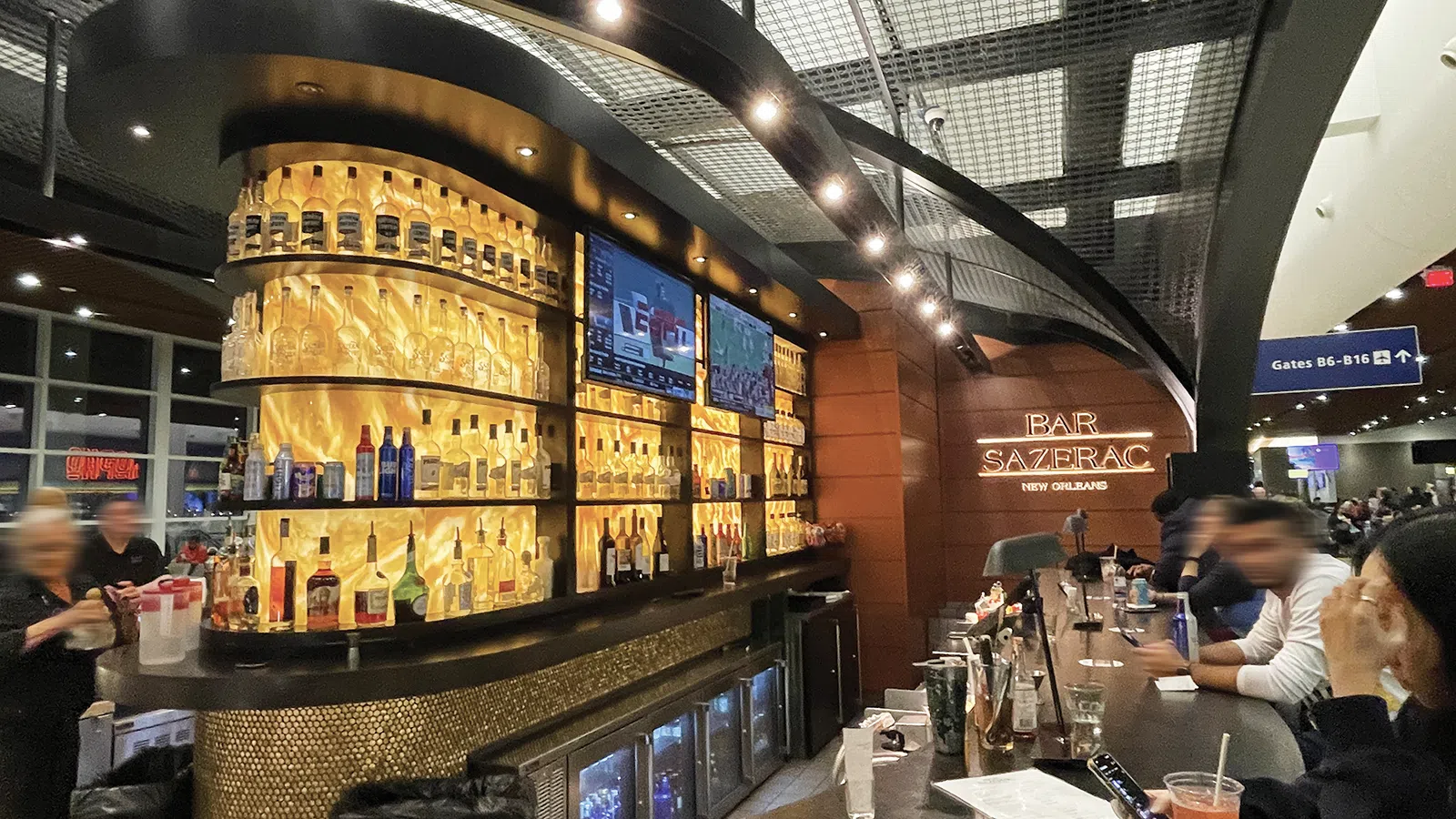 a bar with many bottles of alcohol