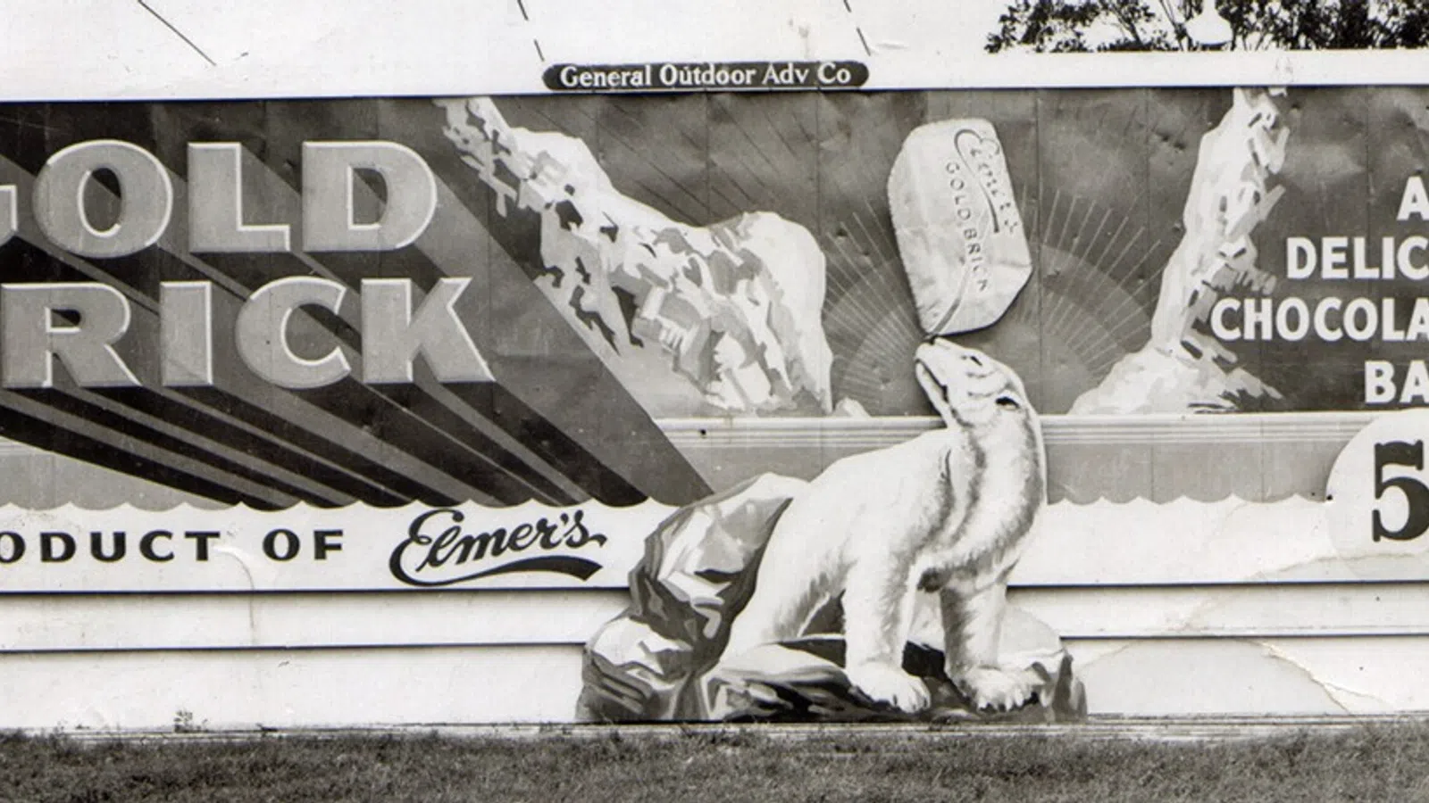 a sign with a person lying on the ground