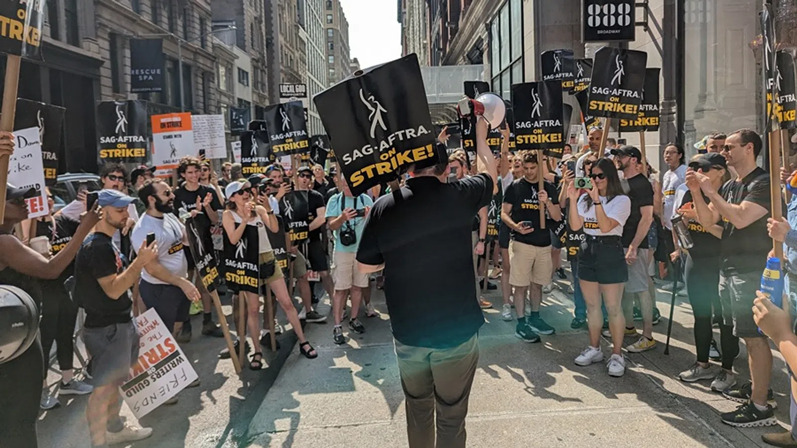 a group of people marching in the street