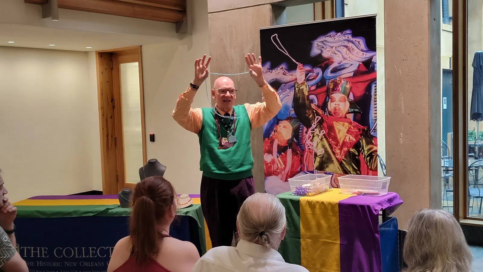 a person standing in front of a group of people