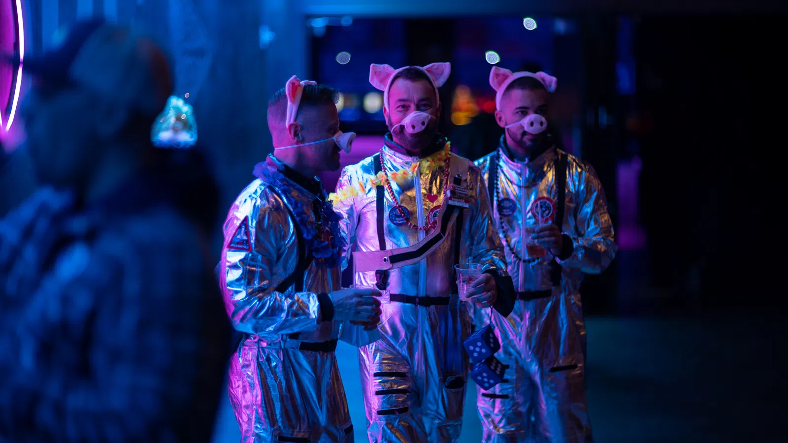 a group of men wearing clothing