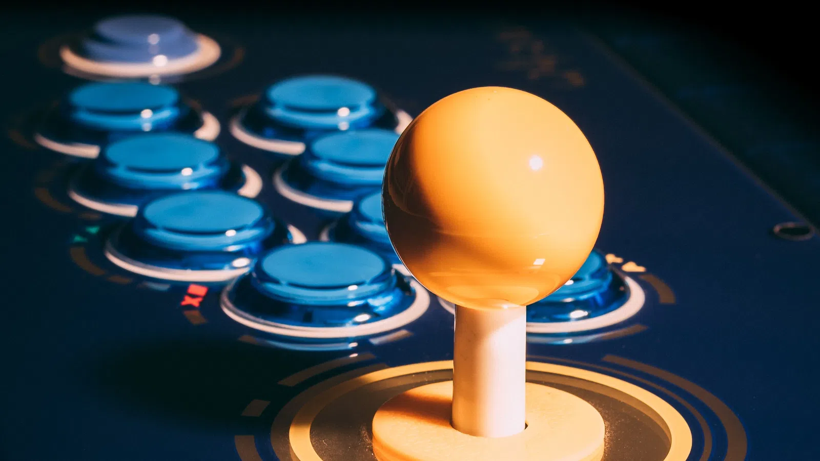 a gold ball on a stand