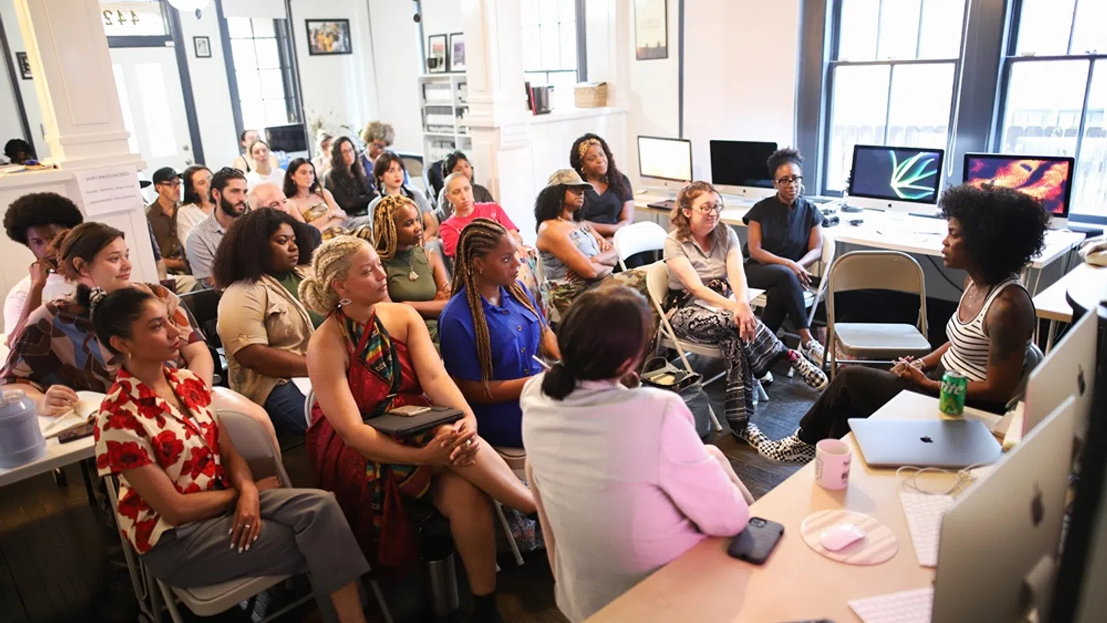 a group of people sitting in a room