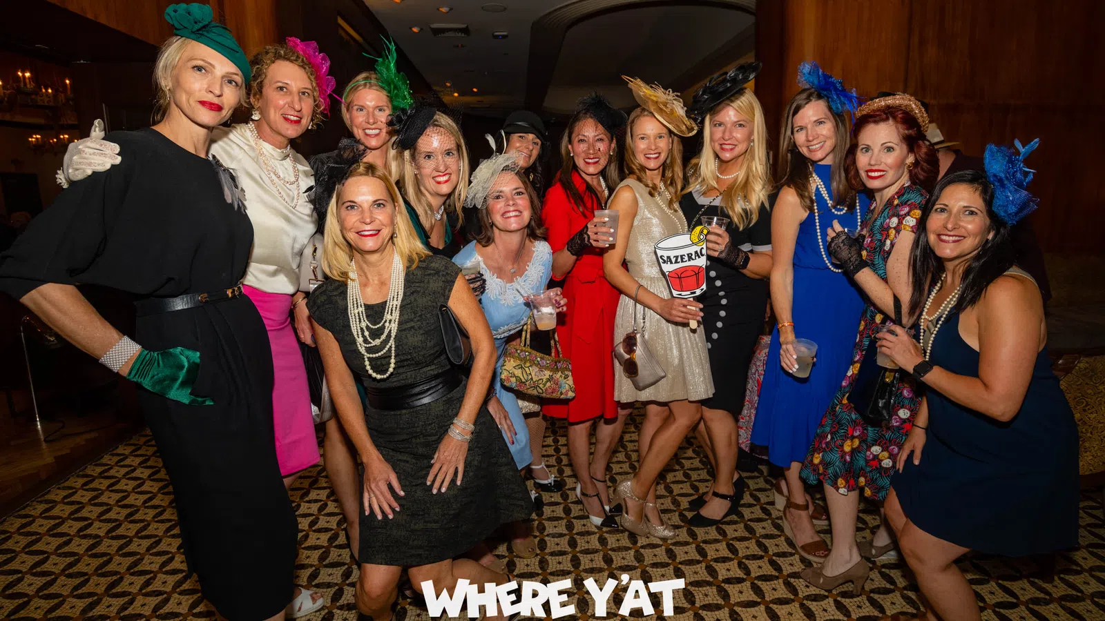 a group of women posing for a photo