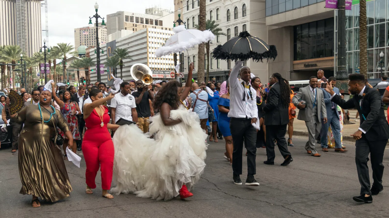 a group of people dancing in a street