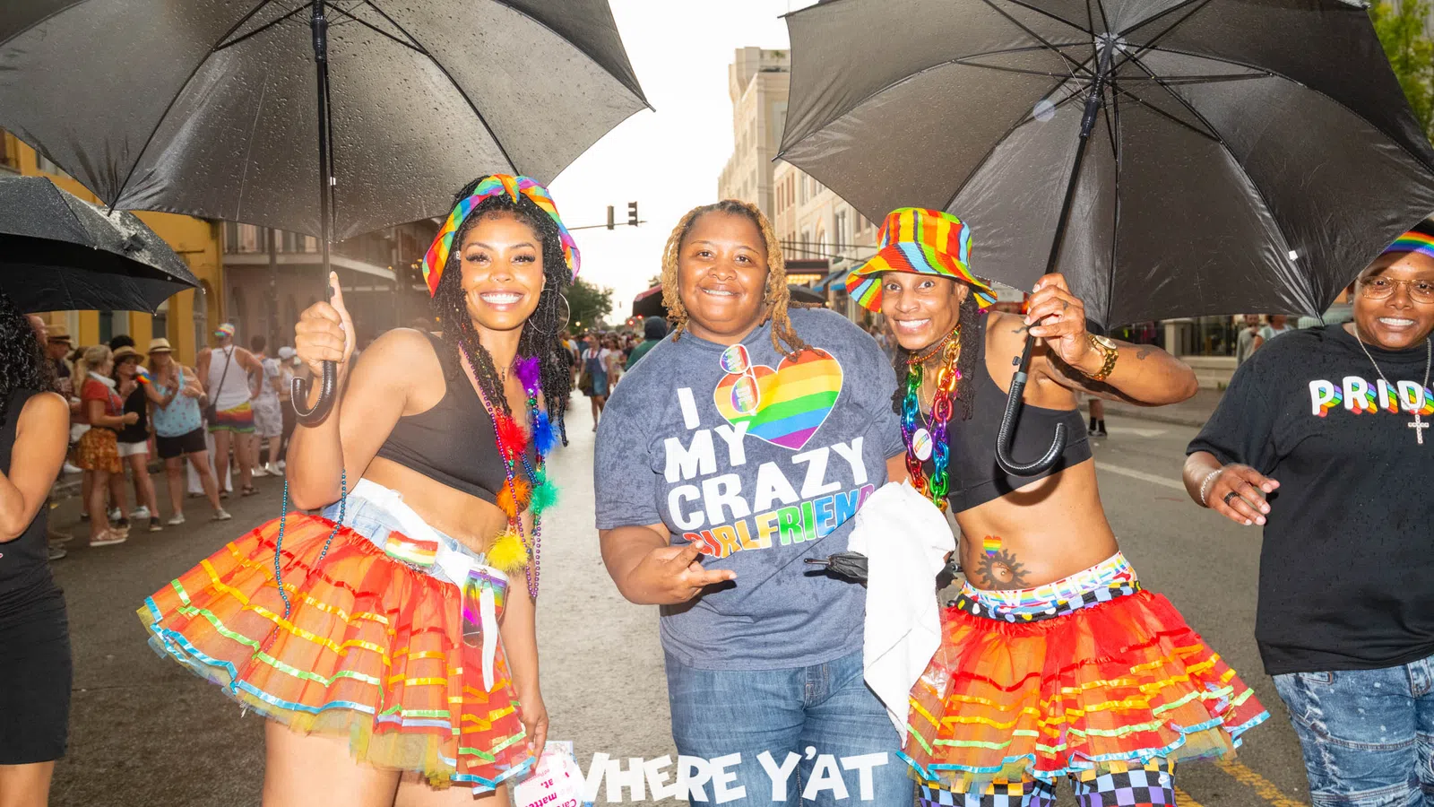 a group of people holding umbrellas