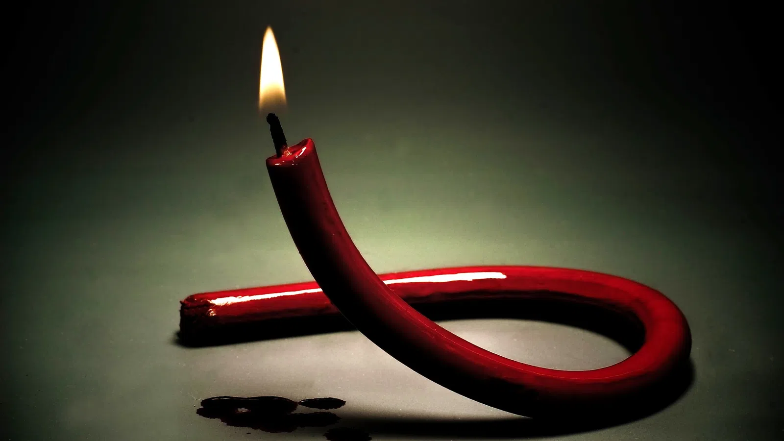 a red and black candle