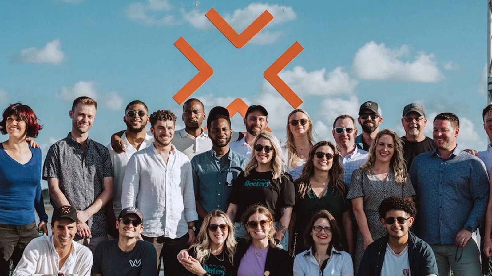 a group of people posing for a photo