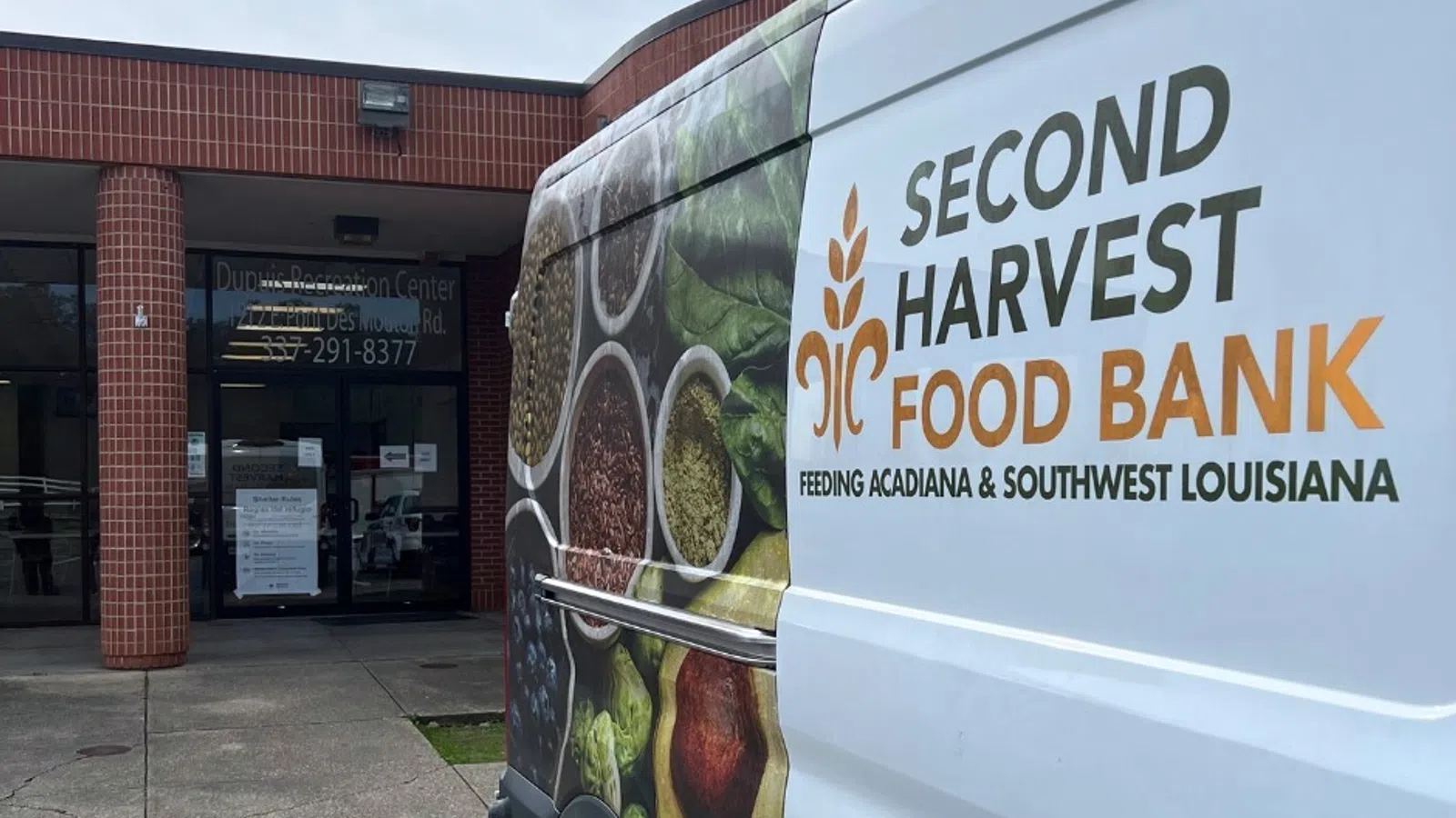 a van is parked outside a store