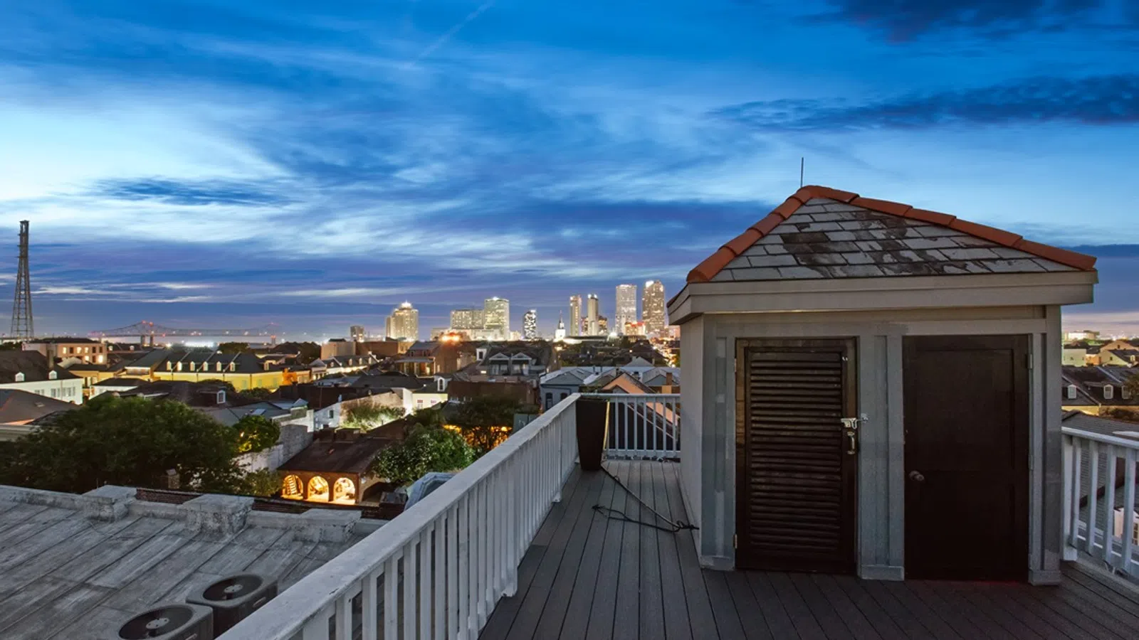 a deck overlooking a city