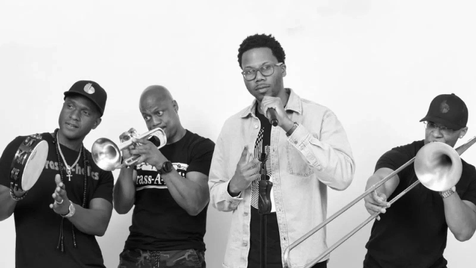a group of men holding microphones