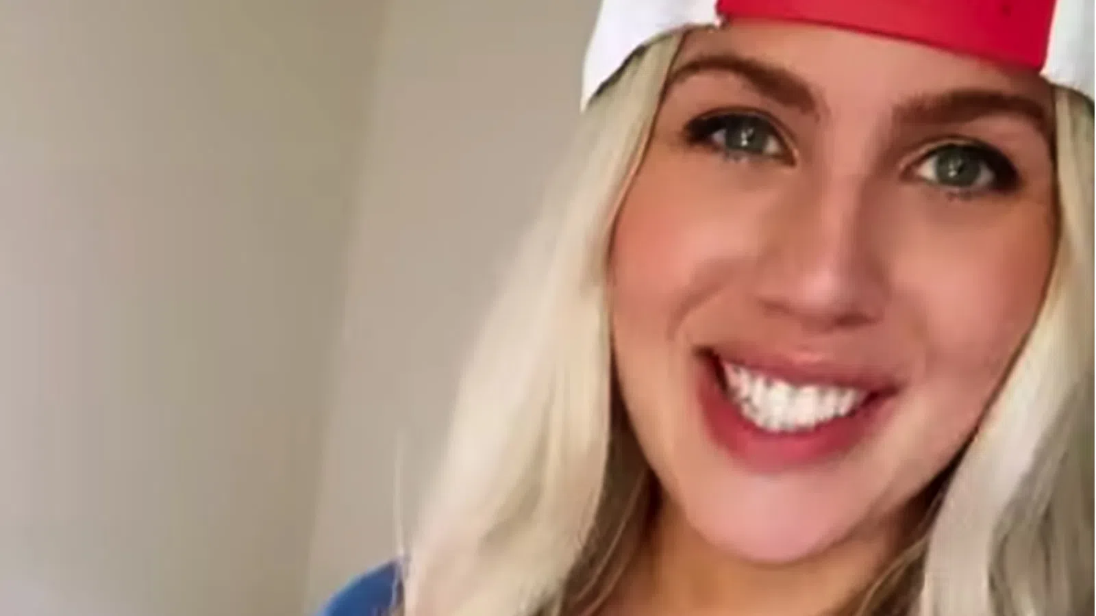 a woman wearing a red hat