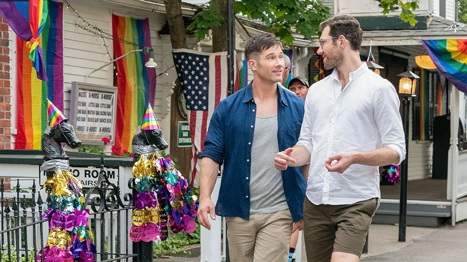 Luke Macfarlane et al. shaking hands