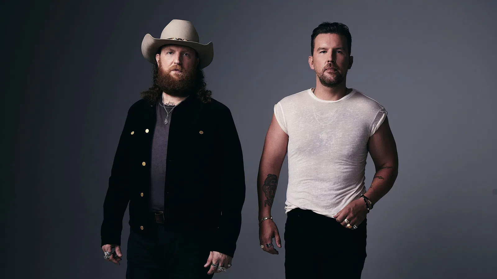 two men standing next to each other