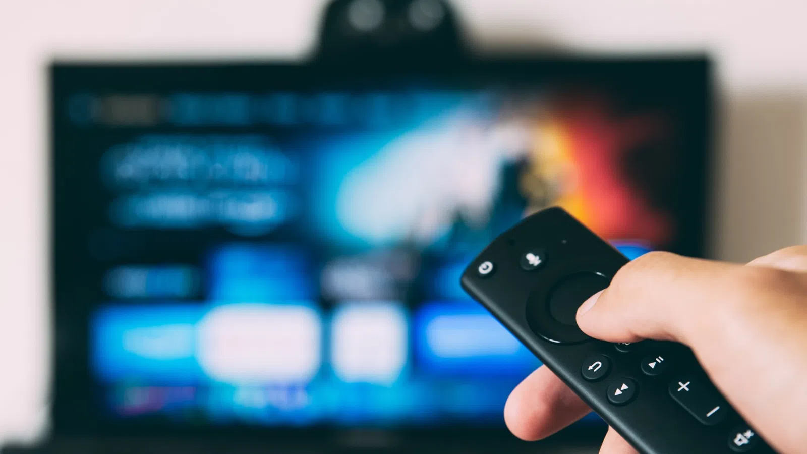 a person holding a remote control