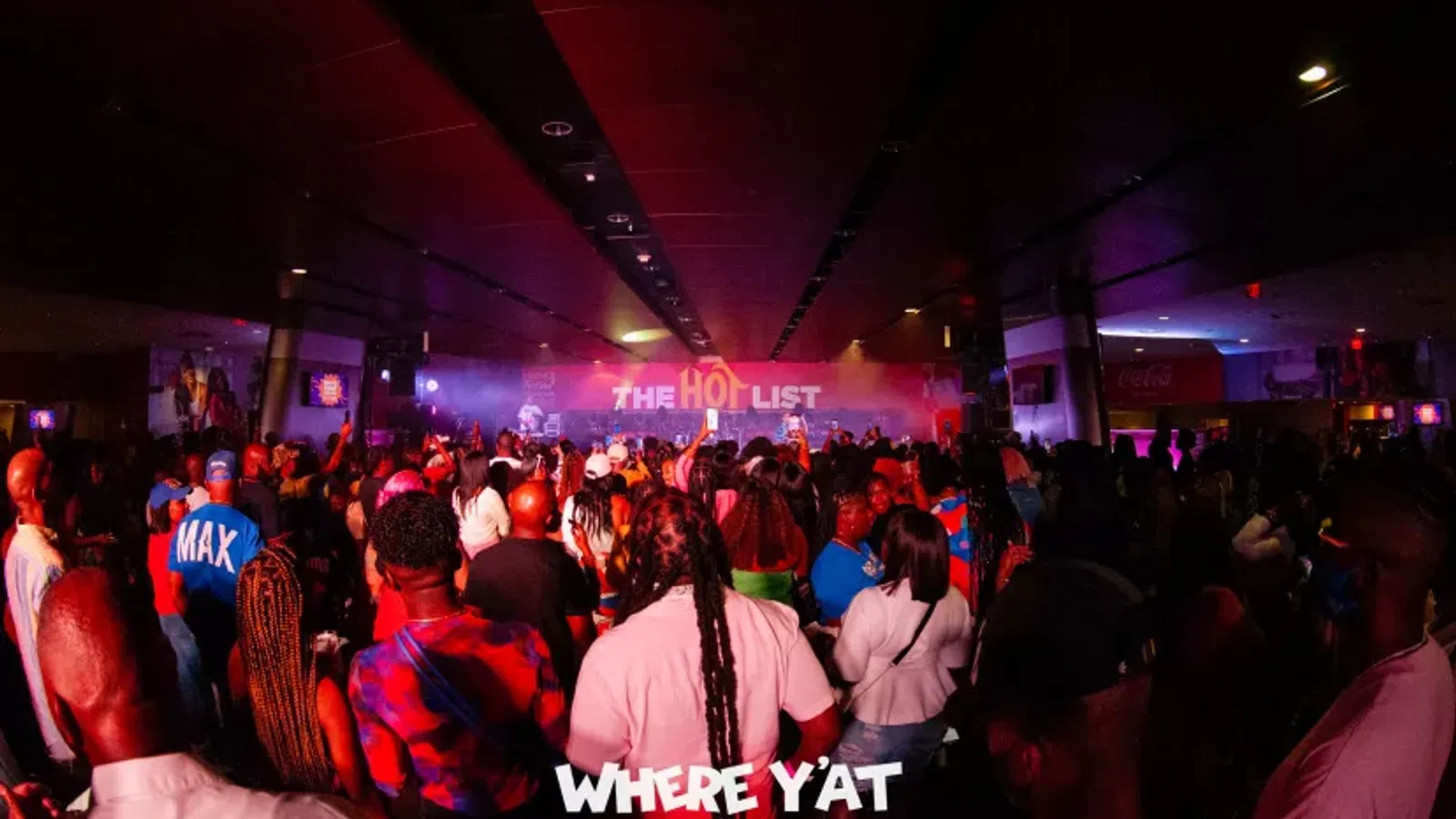 a crowd of people in a room