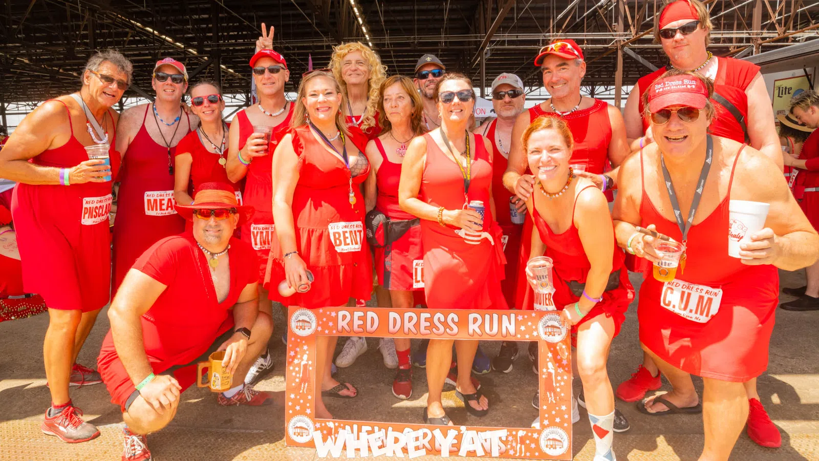 a group of people wearing red uniforms