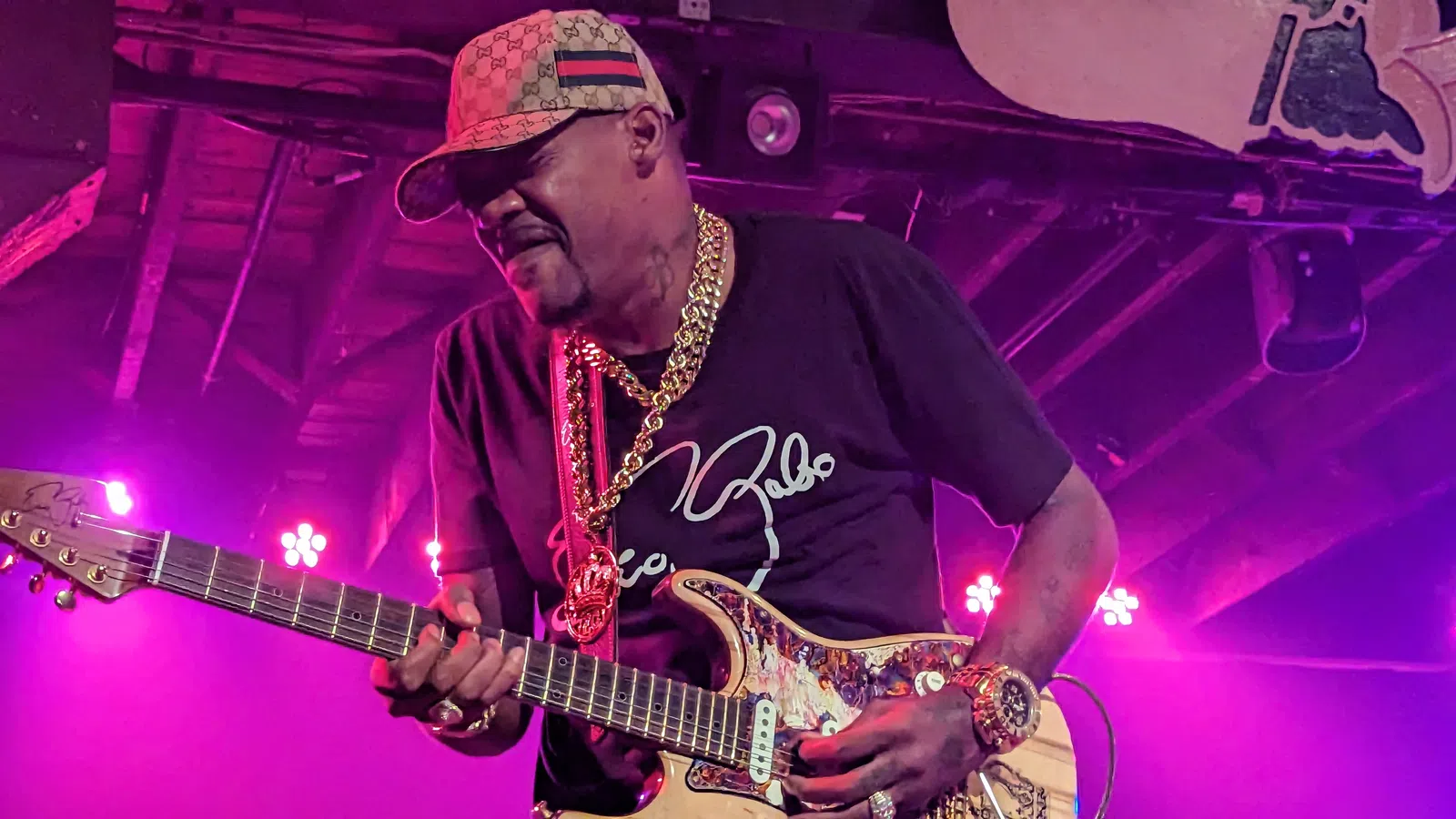 a man playing a guitar