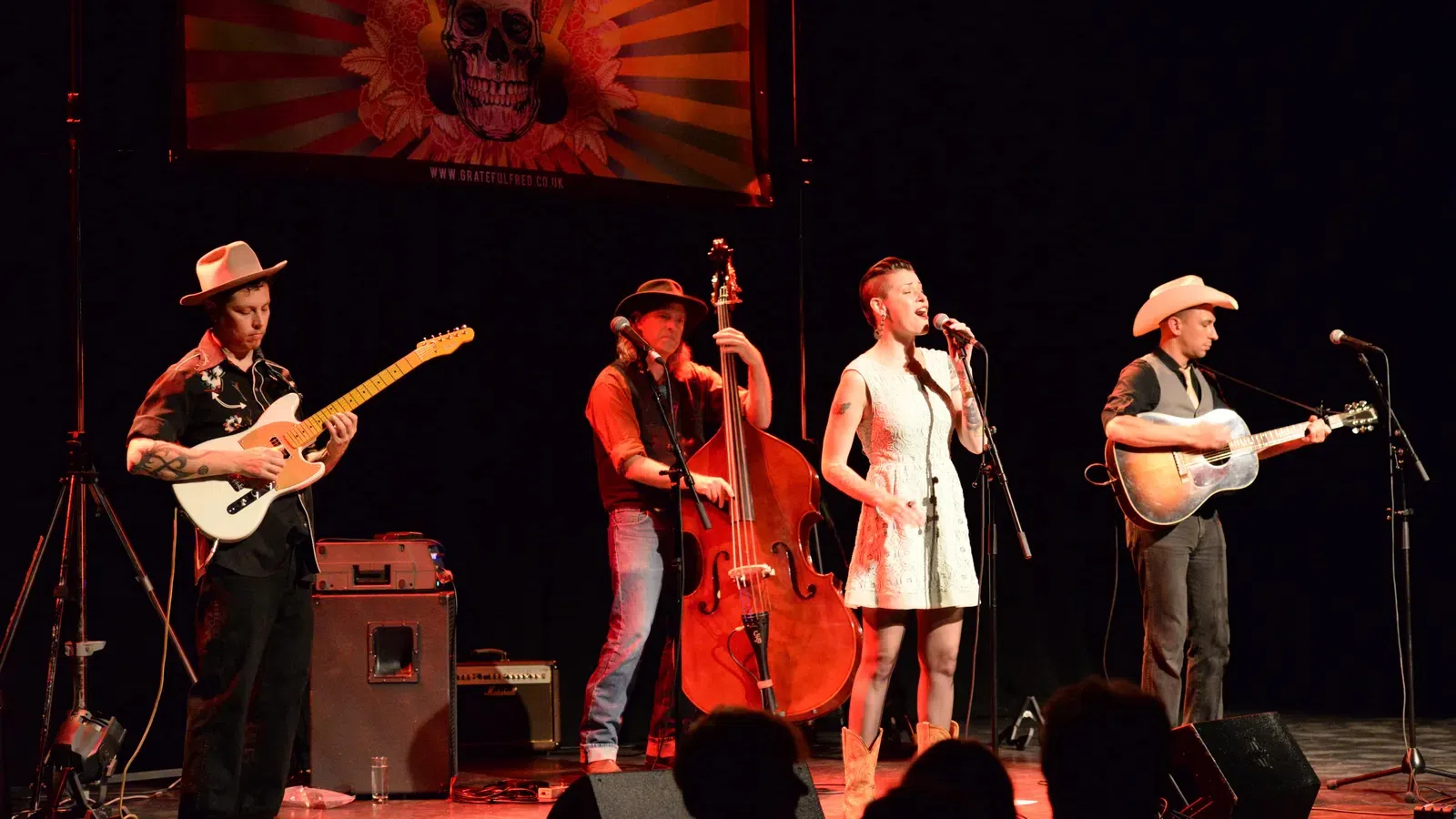 a group of people on a stage
