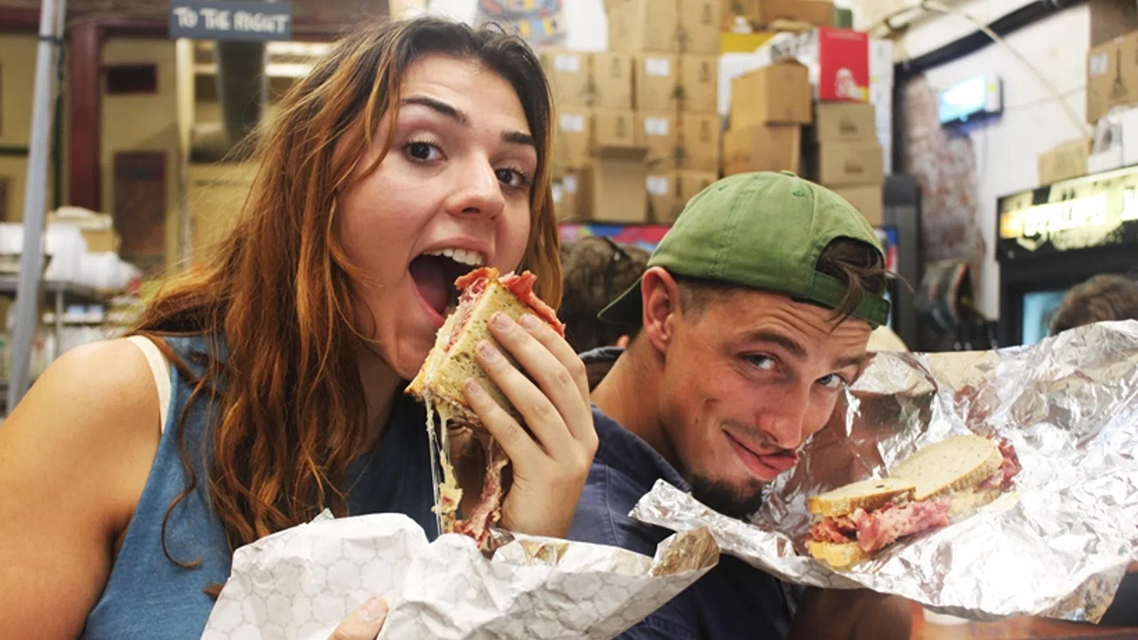 a man and woman eating food