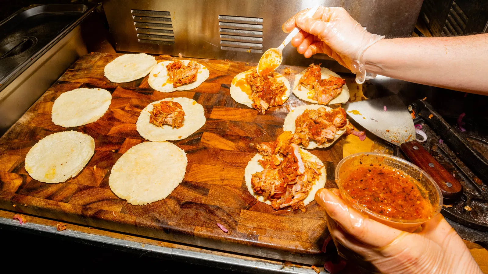 a person making a pizza