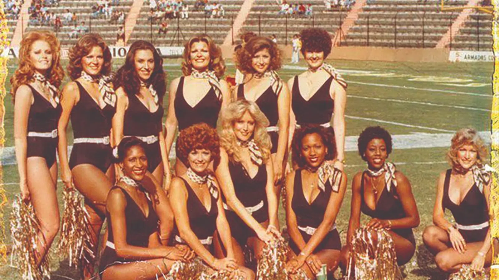 a group of women posing for a photo