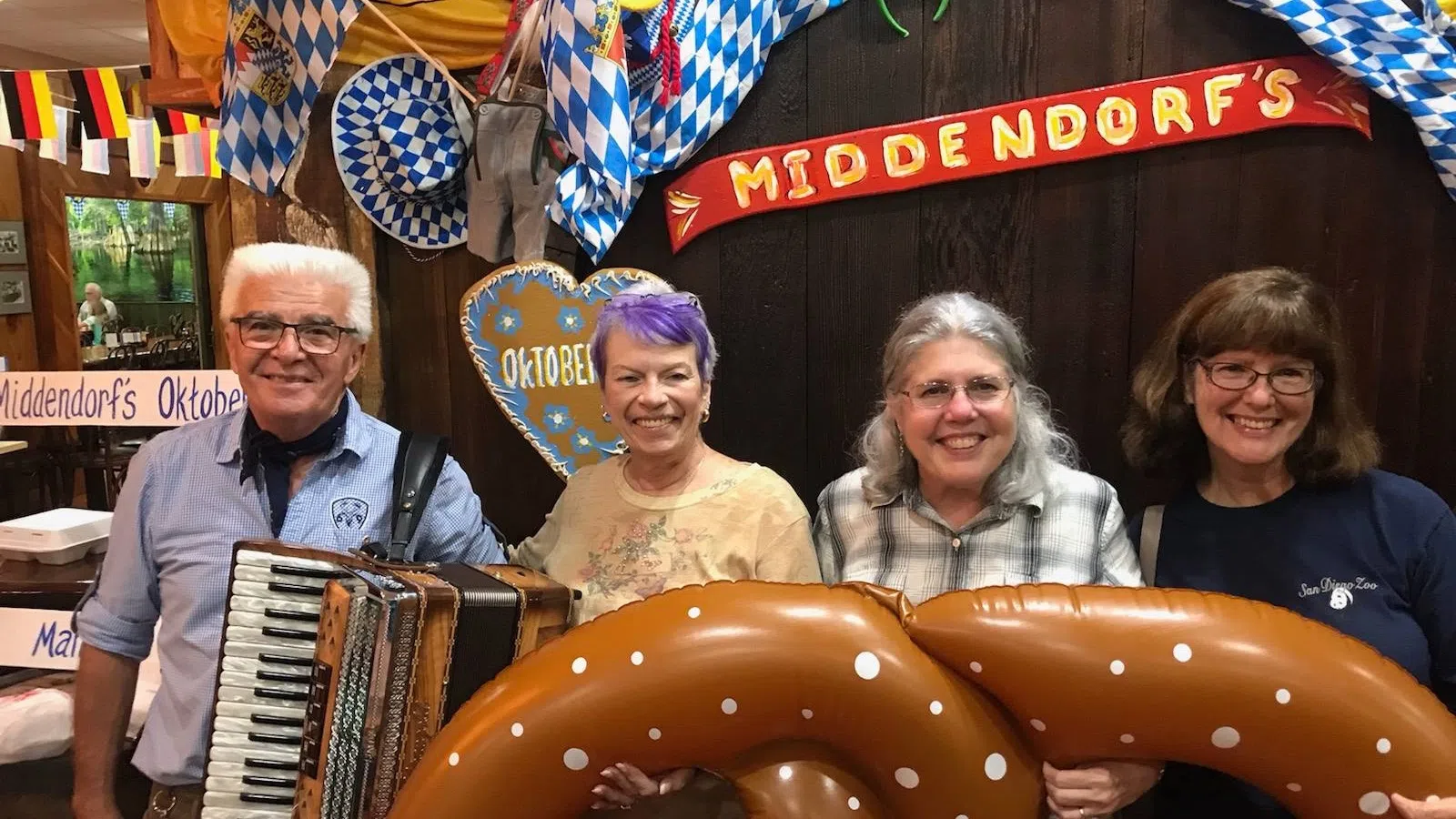 a group of people holding musical instruments