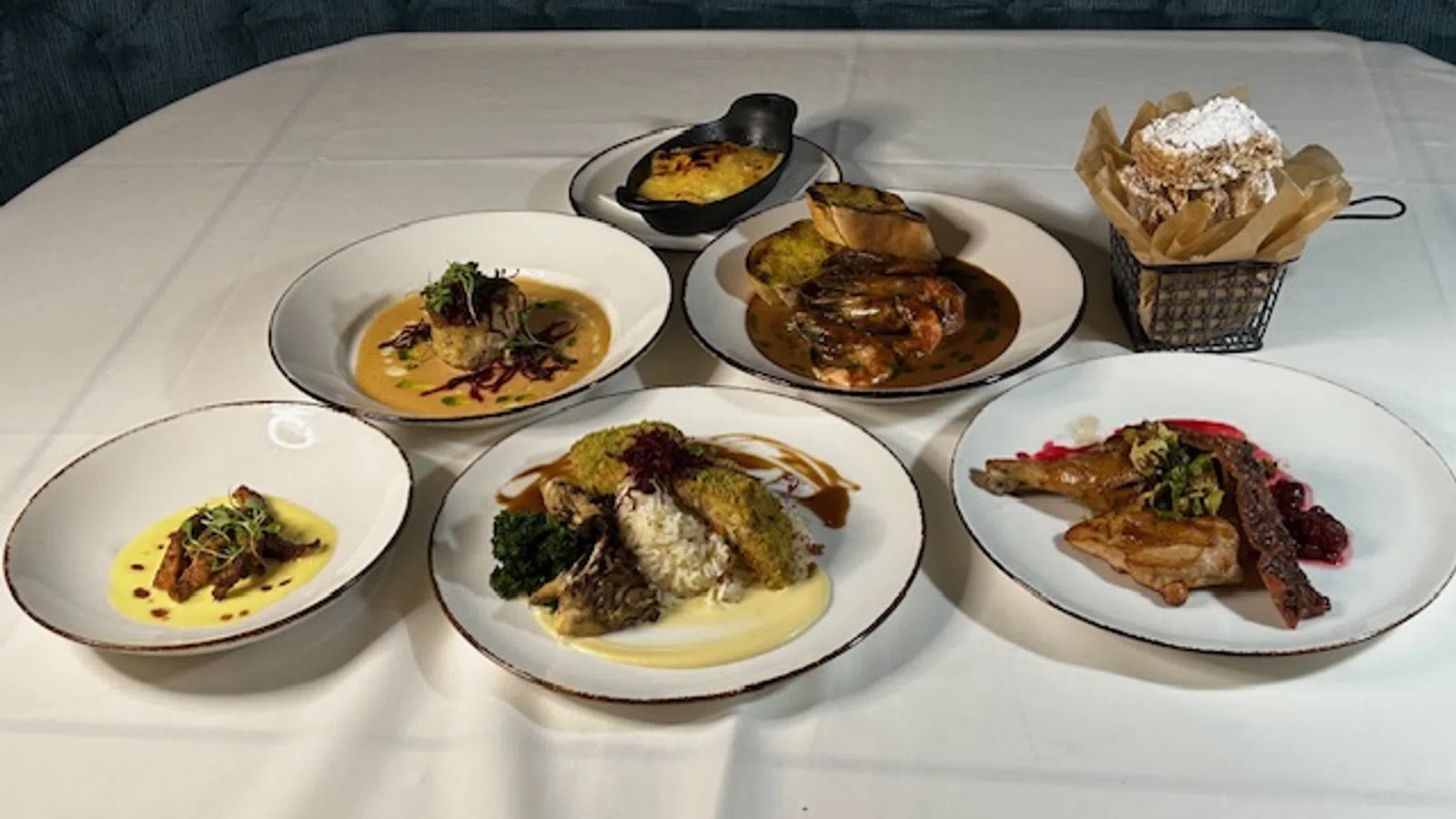 a table full of plates of food