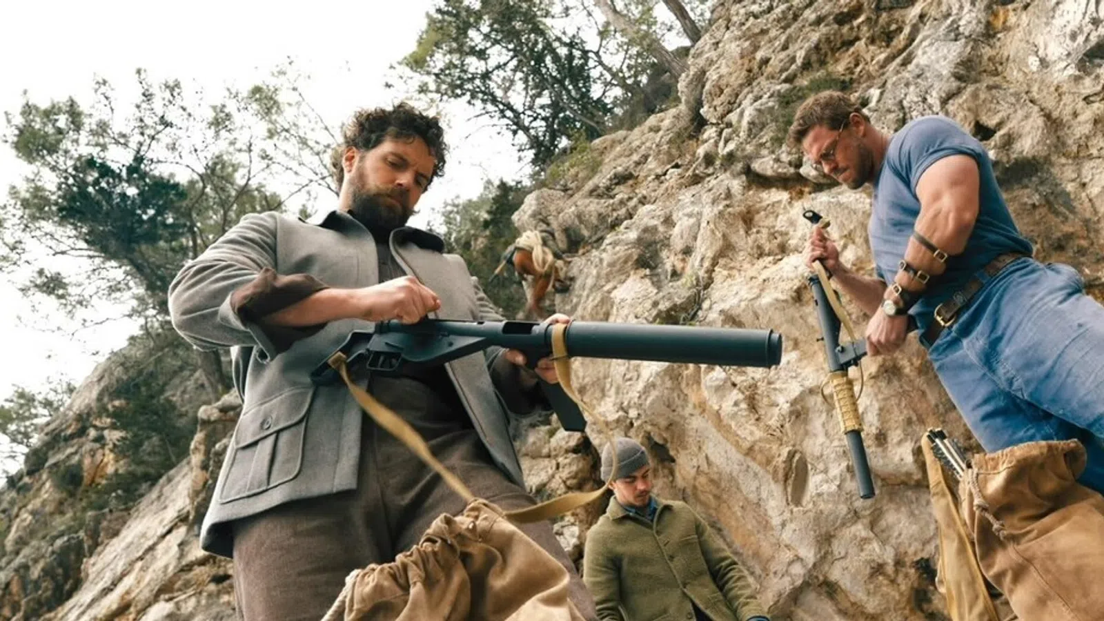 a group of men holding guns