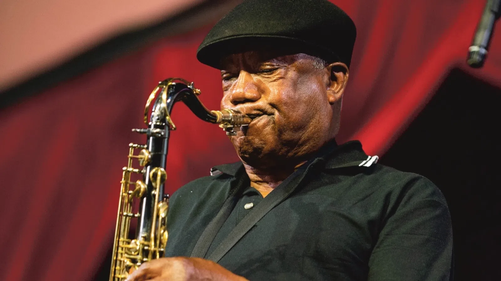 a man playing a saxophone