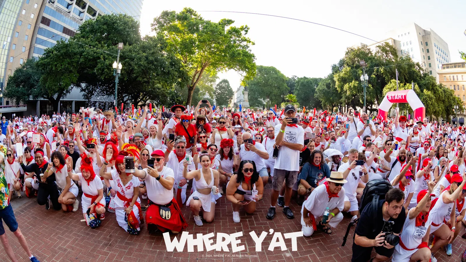 a large group of people posing for a photo