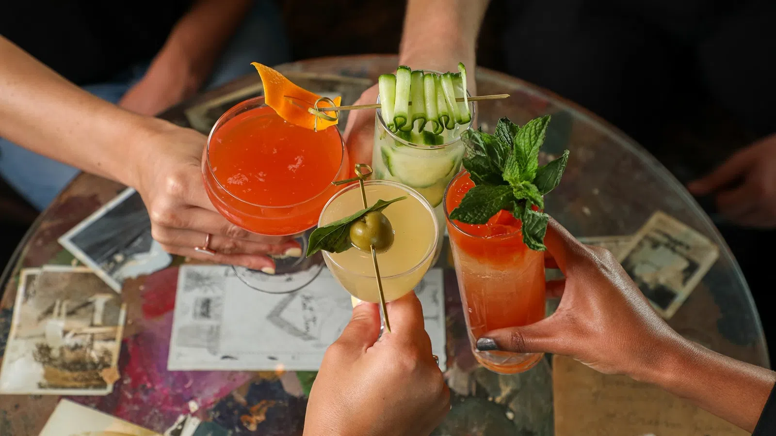 a group of people holding drinks