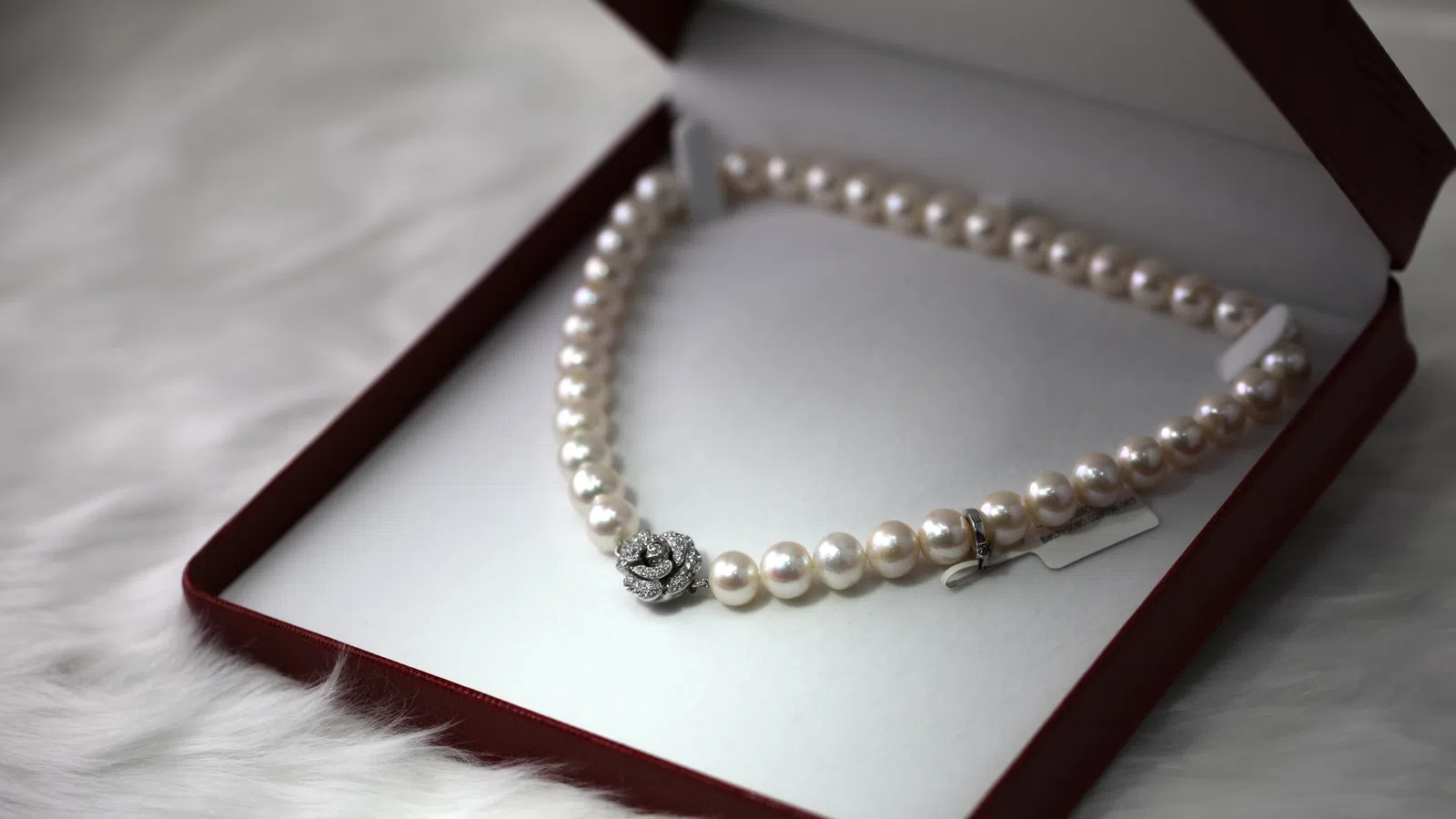 a gold bracelet on a book