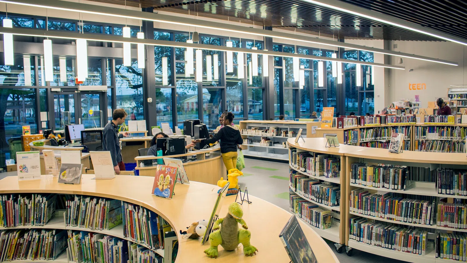 people working in a library