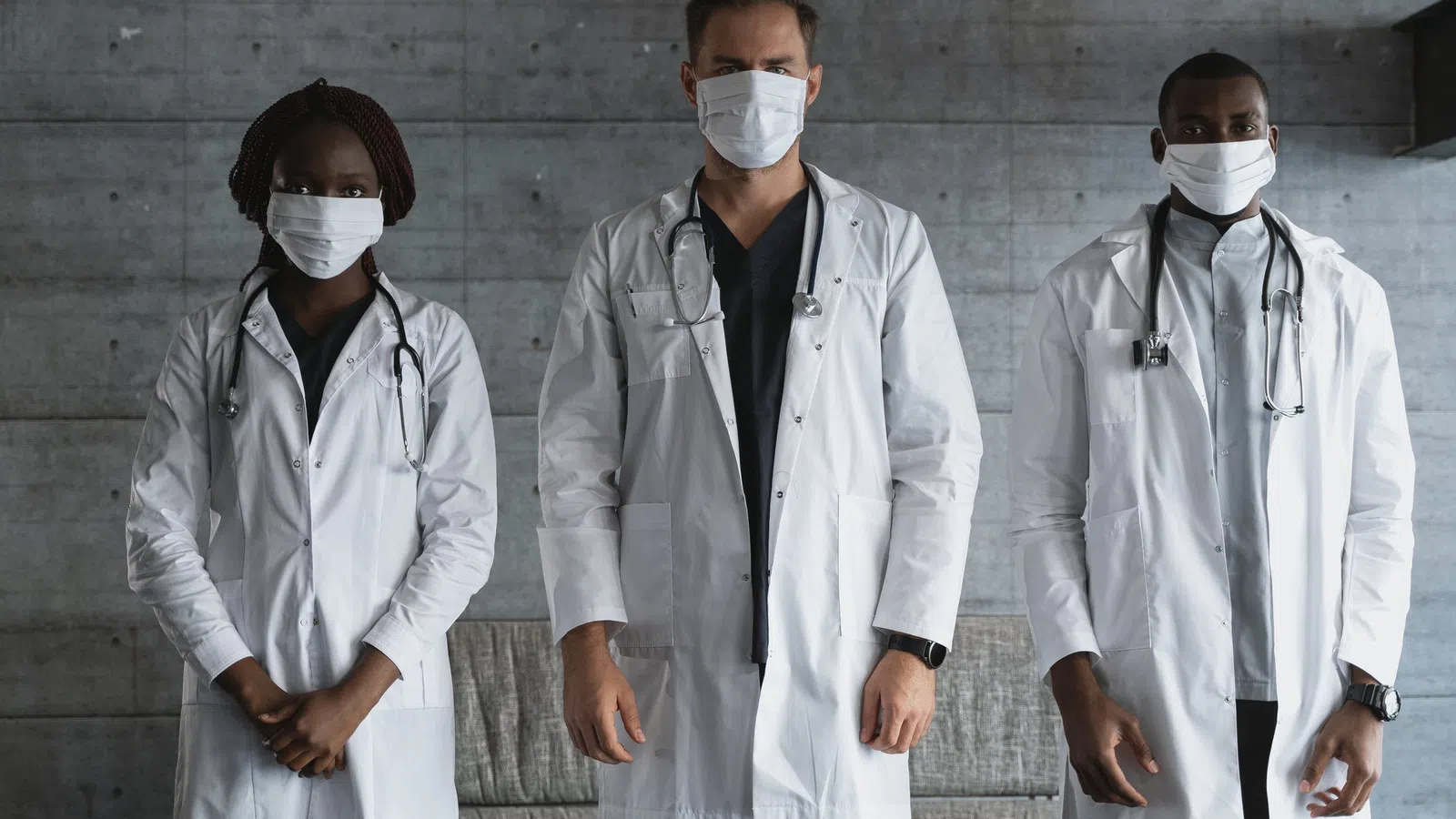 a group of people wearing masks