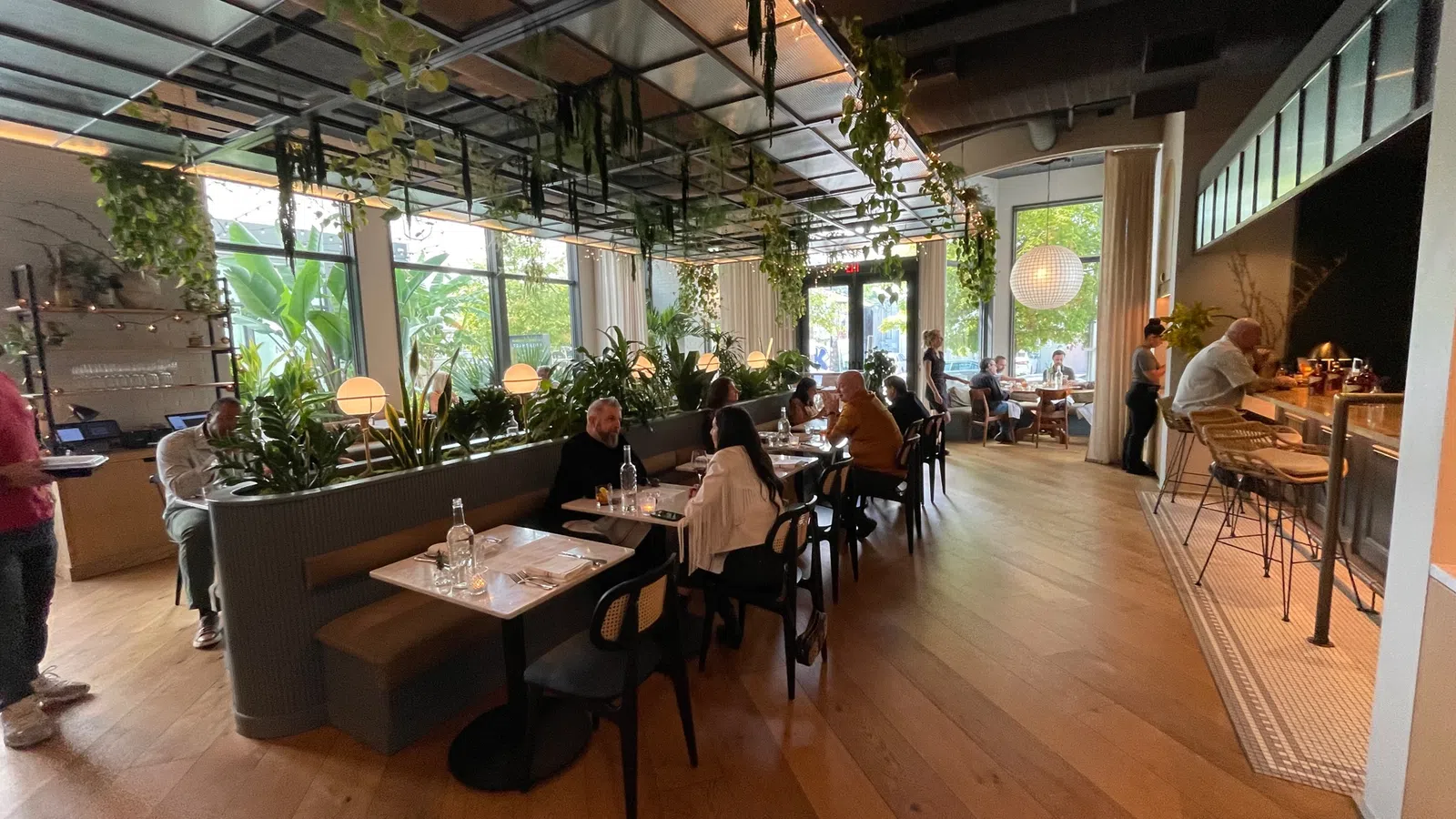 a group of people sitting at tables