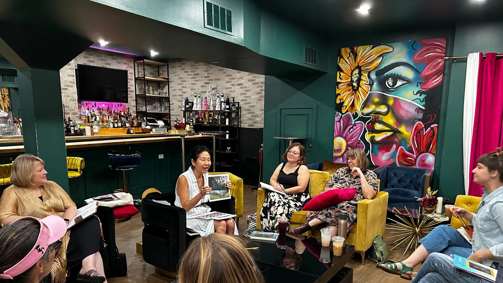 a group of people sitting in a room
