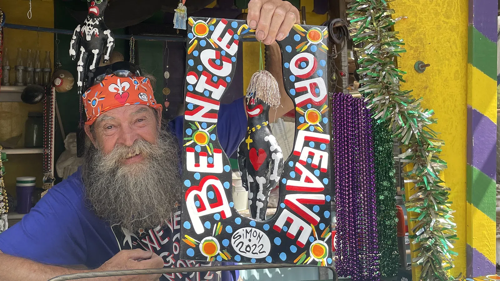 a man holding a snowboard