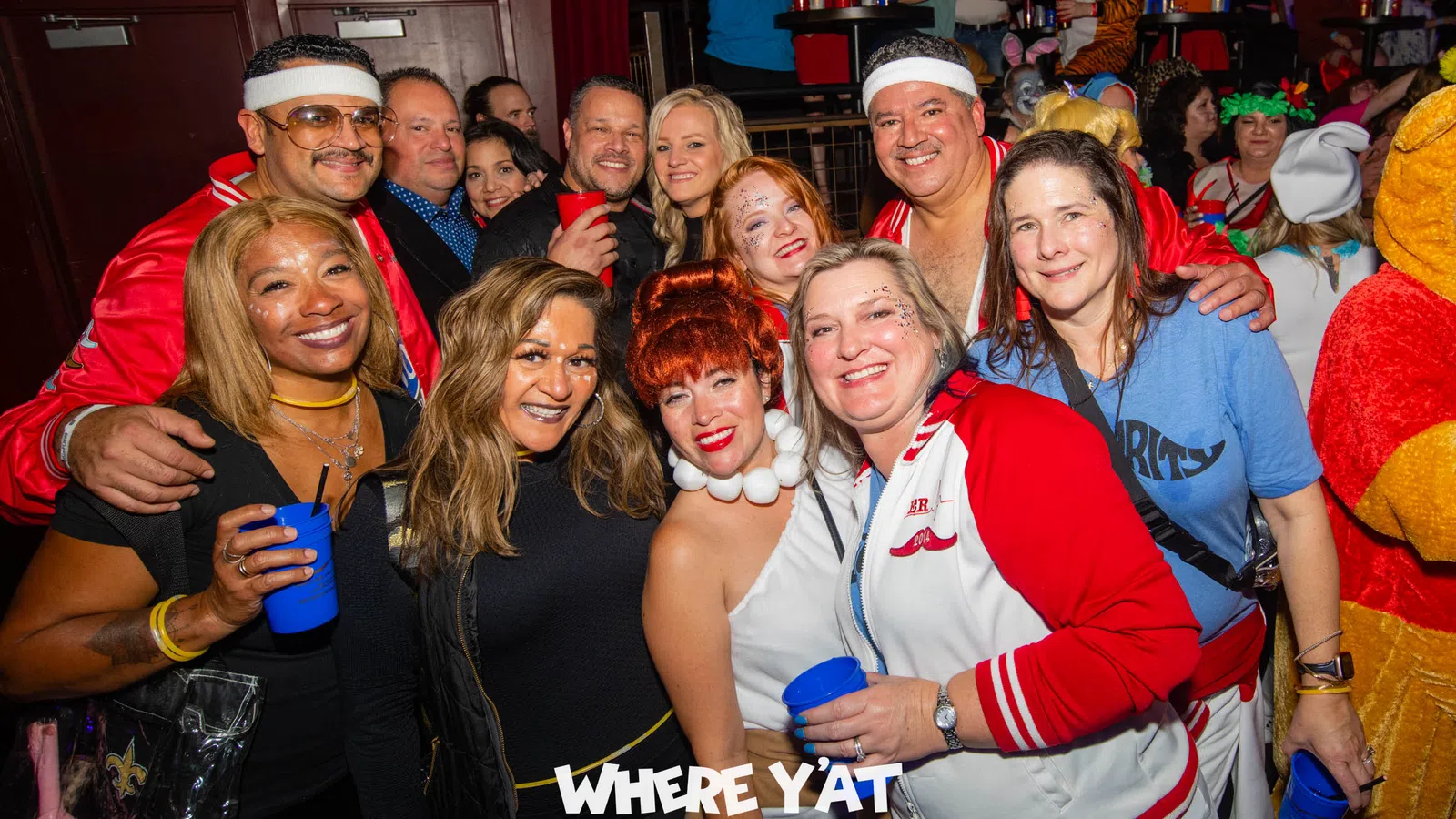 a group of people posing for a photo
