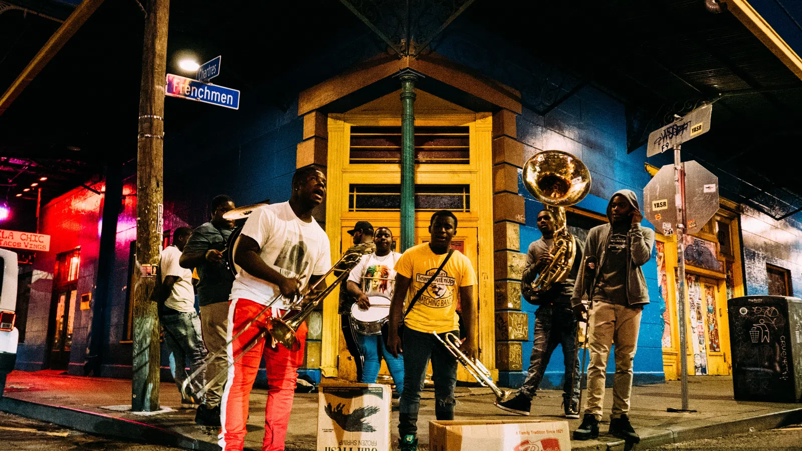 a group of people standing outside a building